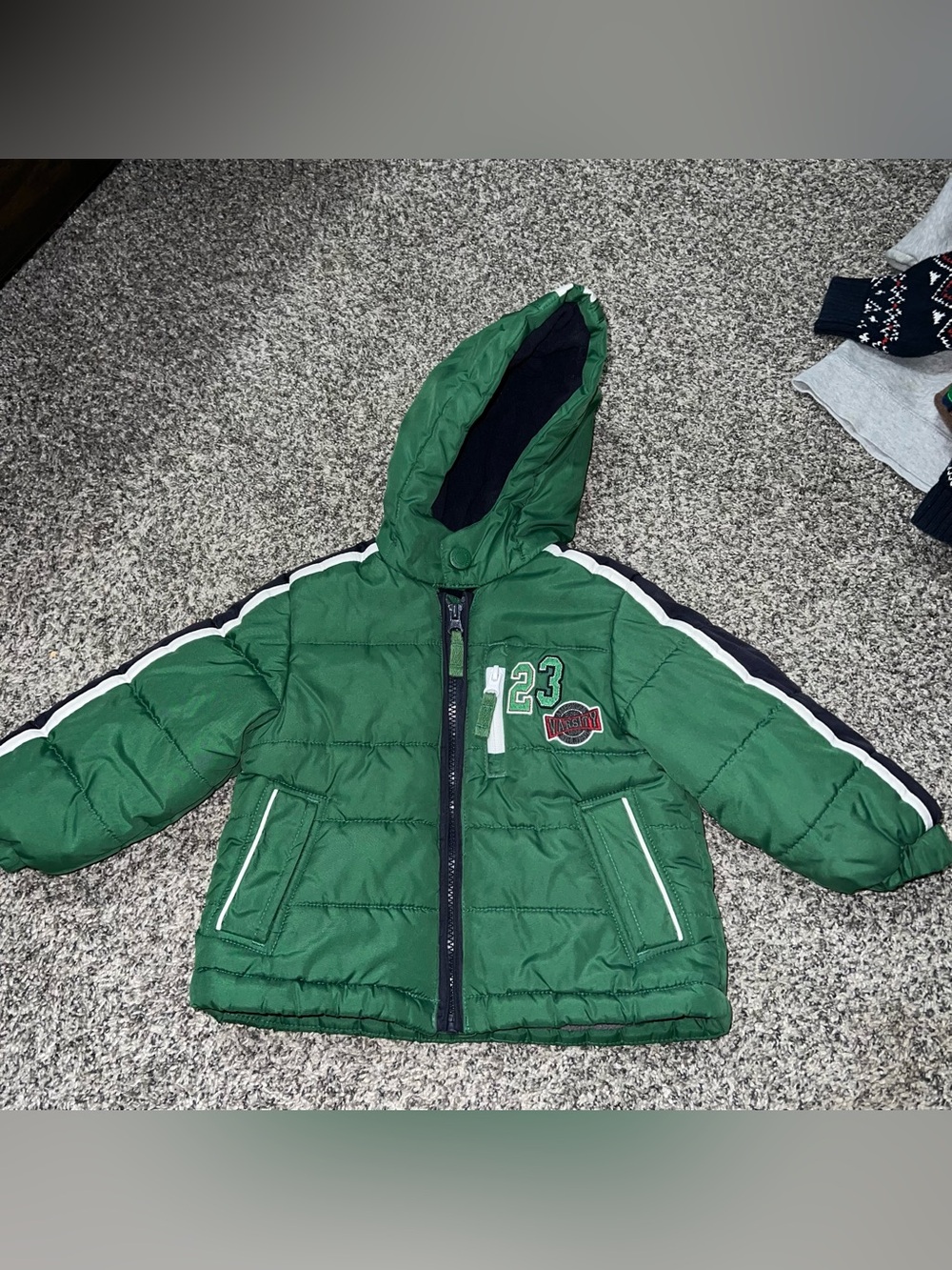 Green Hooded Puffer Jacket with Number 23 Patch